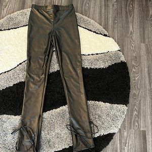 Fashion nova Pleather legging/pants tie bottoms. Size medium/Large